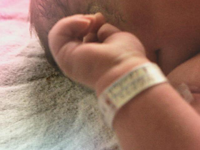 Woman posts picture of premature baby born in amniotic sac