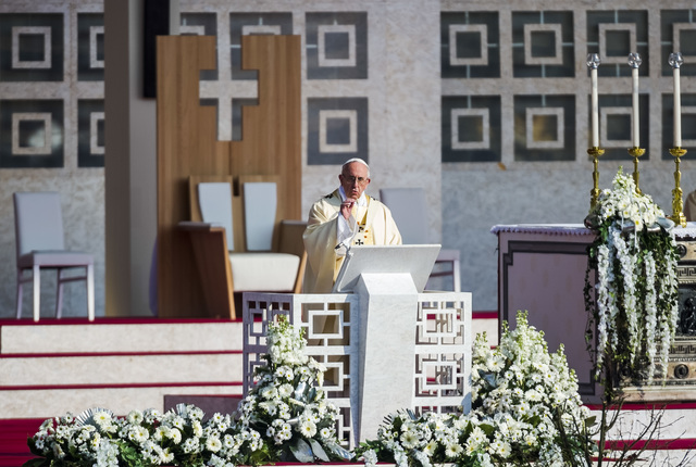 Pope visits Milan housing project; urges compassion for poor