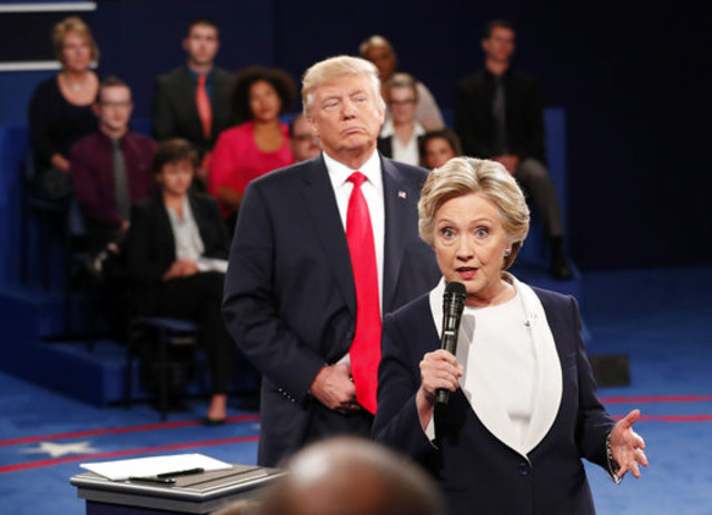 Clinton: My 'skin crawled' as Trump hovered on debate stage