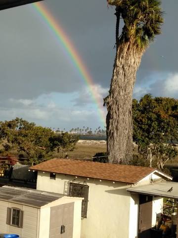 Rainbows, snow from San Diego's winter storm