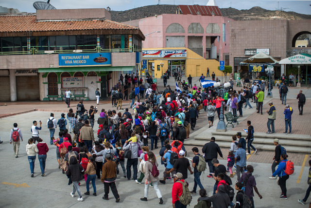 11 caravan members charged with illegally entering U.S.