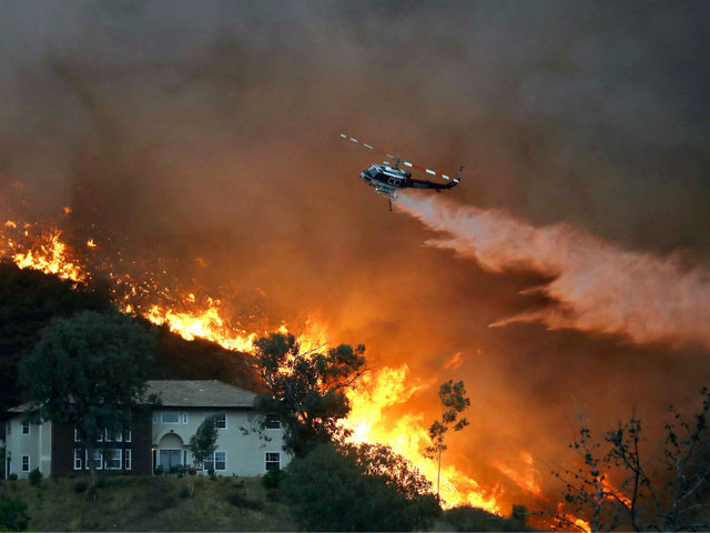 Holy Fire grows in acreage, containment