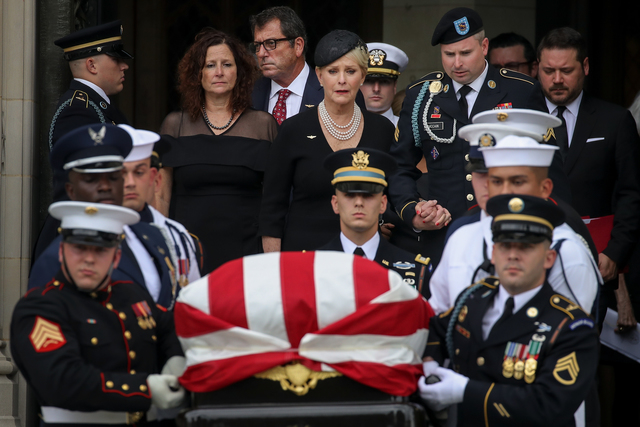 McCain buried at Naval Academy alongside a longtime friend