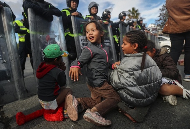 Migrant caravan awaits next step
