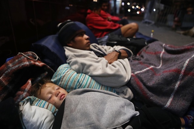 Migrant caravan awaits next step